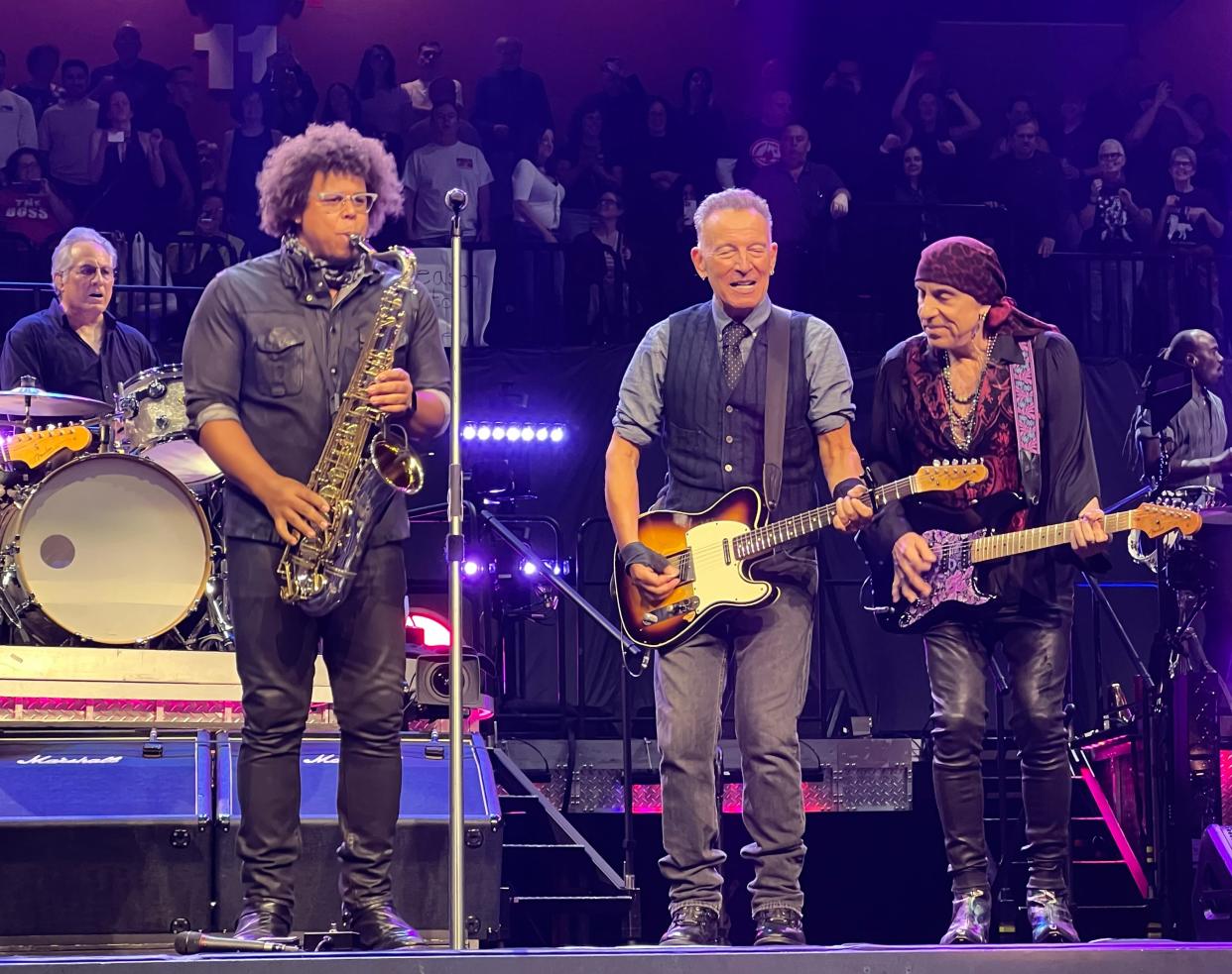 Bruce Springsteen with E Street members Jake Clemons, left, and Steven Van Zandt at Mohegan Sun Friday night.
