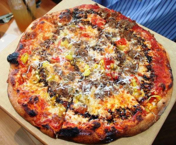Some Like It Hot is just one of the many pizzas offered at Upper Crust Wood-Fired Pizza.