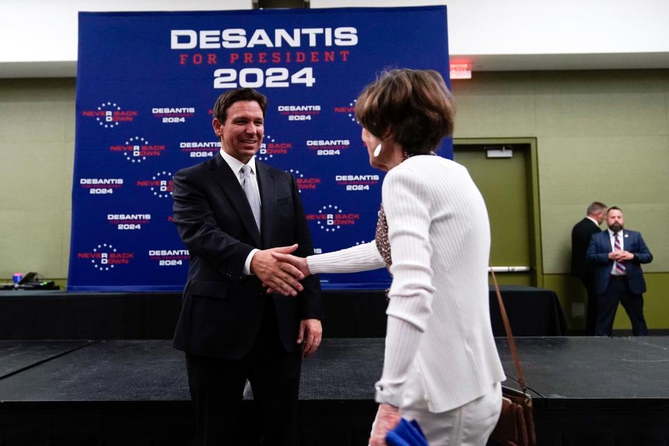 Republican presidential candidate Florida Gov. Ron DeSantis greets supporters at the Republican Party of Iowa's 2023 Lincoln Dinner in Des Moines, Iowa, Friday, July 28, 2023.