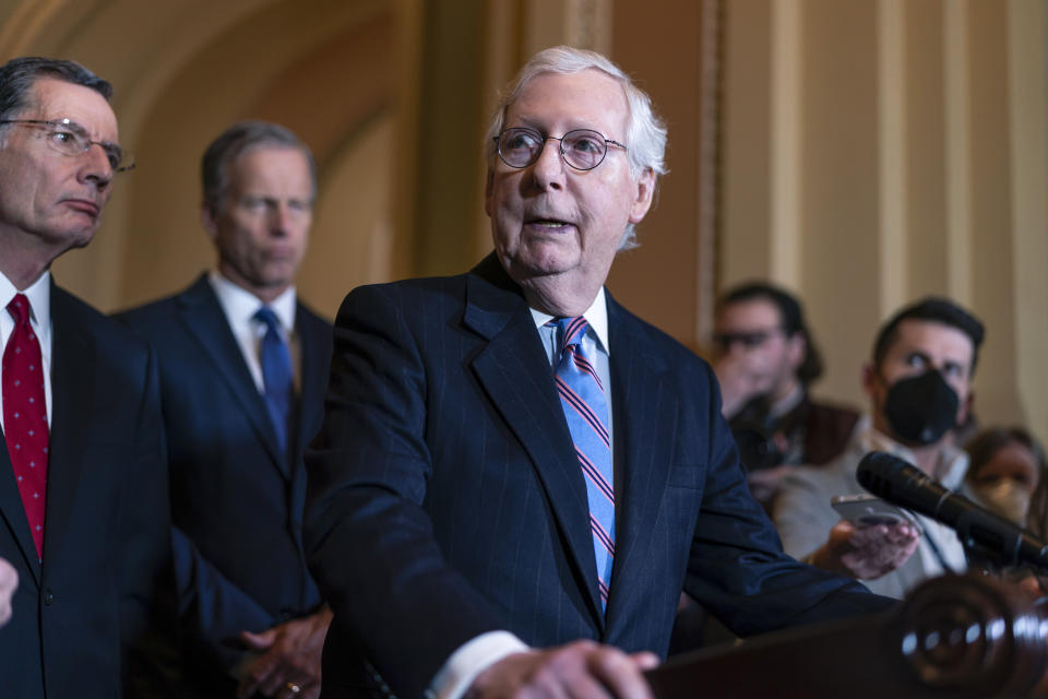 Senate Minority Leader Mitch McConnell, R-Ky., joined from left by Sen. John Barrasso, R-Wyo., and Minority Whip John Thune, R-S.D., speaks to reporters after a Republican strategy meeting at the Capitol in Washington, Tuesday, March 15, 2022. Republicans criticized President Joe Biden for the high price of gasoline. (AP Photo/J. Scott Applewhite)