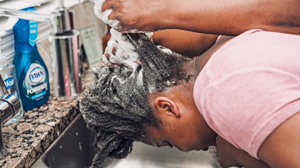 Many Black families use their kitchens for wash day. "Easy access to a sink, space to place multiple supplies and products, in addition to the ability to interact with the rest of the family, watch television and eat a snack," Faxio explains in her book, "makes the location convenient and comfortable." - Tomesha Faxio