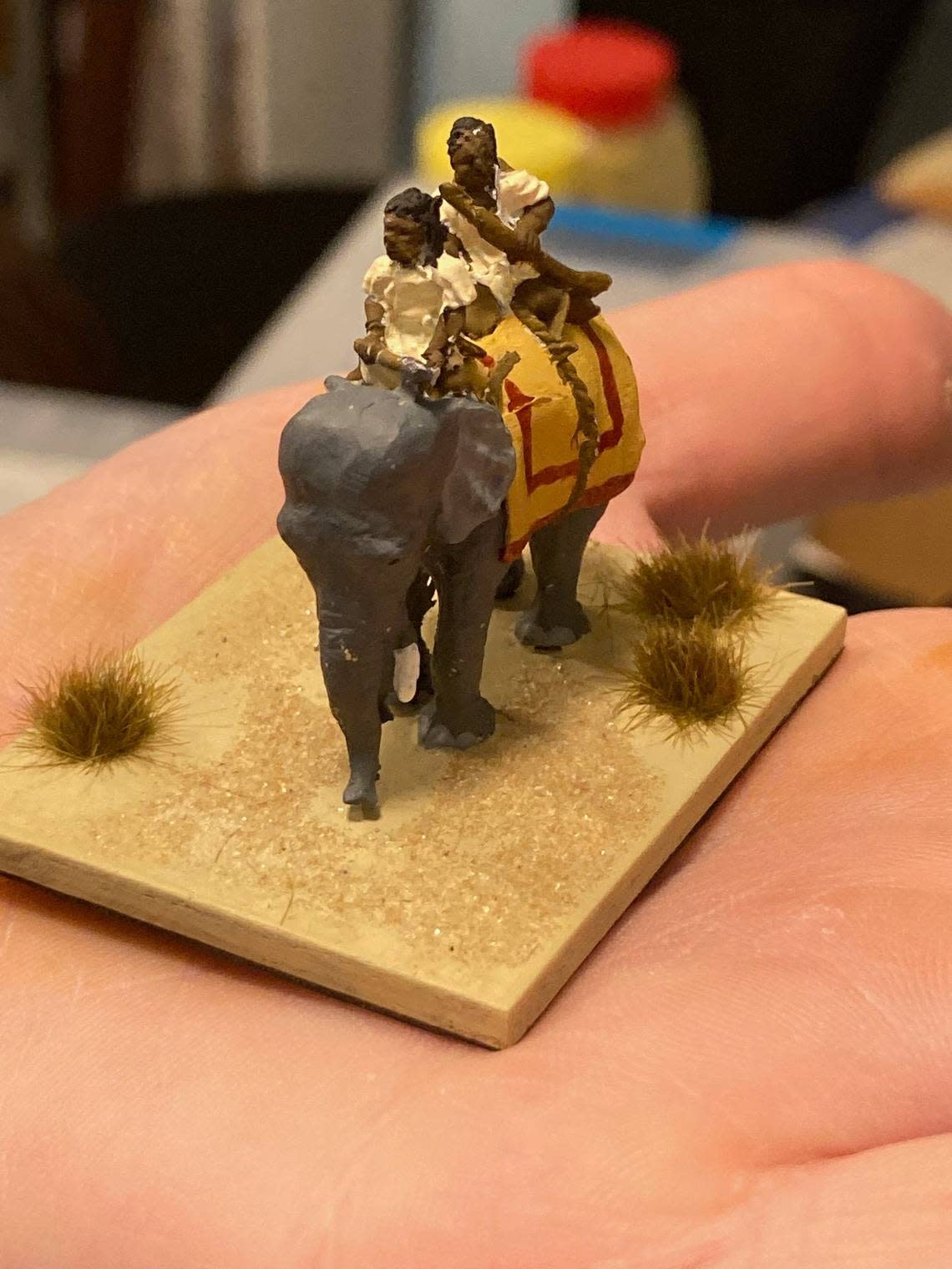 In miniature, this elephant, painted by a former Baker University student, is an overwhelming war-gaming force on the battlefields of the fourth century.