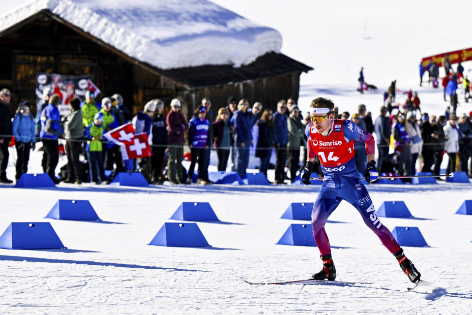 Ben Ogden of the United States in action during the men's sprint prologue at the FIS Cross-Country World Cup at the Nordic Center Goms, in Geschinen, Switzerland, Saturday, Jan. 27, 2024. (Jean-Christophe Bott/Keystone via AP)