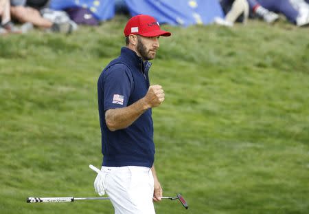 Golf - 2018 Ryder Cup at Le Golf National - Guyancourt, France - September 30, 2018 - Team USA's Dustin Johnson during the Singles REUTERS/Regis Duvignau
