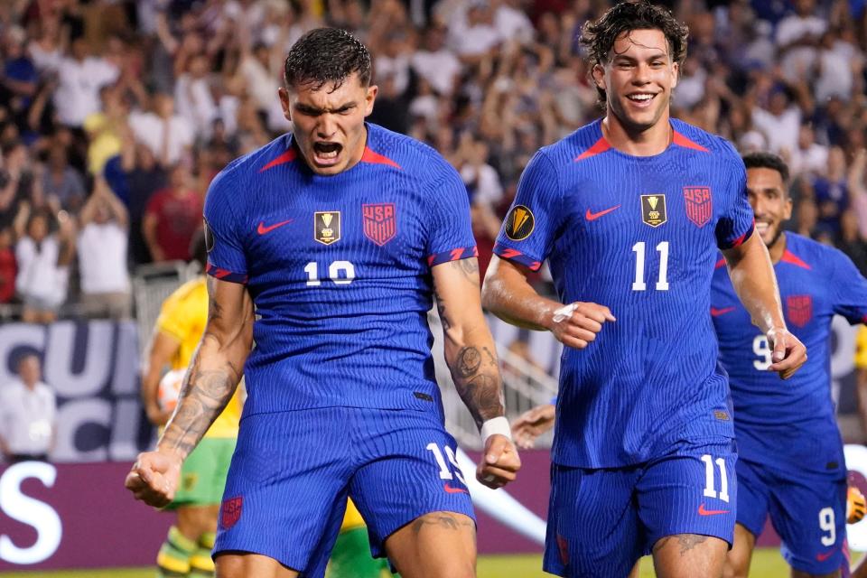 United States forward Brandon Vazquez (19) celebrates his game-tying goal against Jamaica with forward Cade Cowell (11) during the second half of a CONCACAF Gold Cup soccer match Saturday, June 24, 2023, in Chicago.