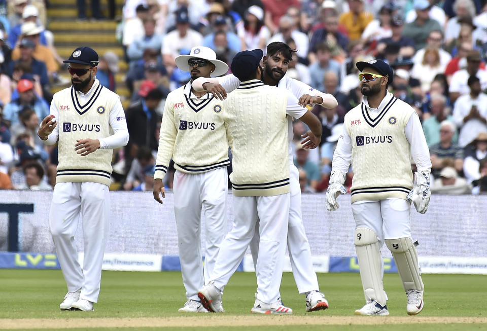 India's Mohammad Siraj, 2nd right, celebrates with team mates after dismissing England's Sam Billings during the third day of the fifth cricket test match between England and India at Edgbaston in Birmingham, England, Sunday, July 3, 2022. (AP Photo/Rui Vieira)