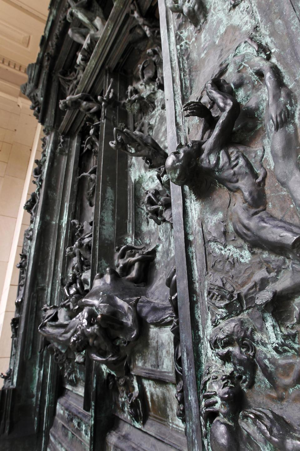 Auguste Rodin's "The Gates of Hell" is displayed at the Rodin Museum on Wednesday, May 16, 2012, in Philadelphia. After a three-year renovation, the museum is scheduled to reopen to the public on July 13. (AP Photo/Alex Brandon)