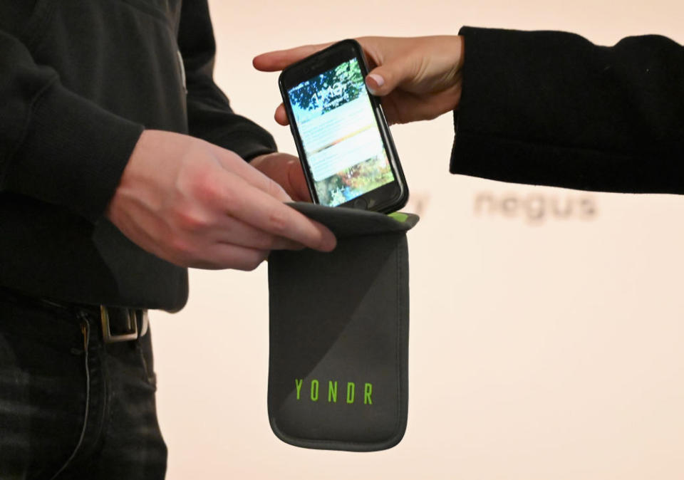 Companies like Yondr market lockable pouches that schools can use to selectively restrict phone access. (Getty Images)