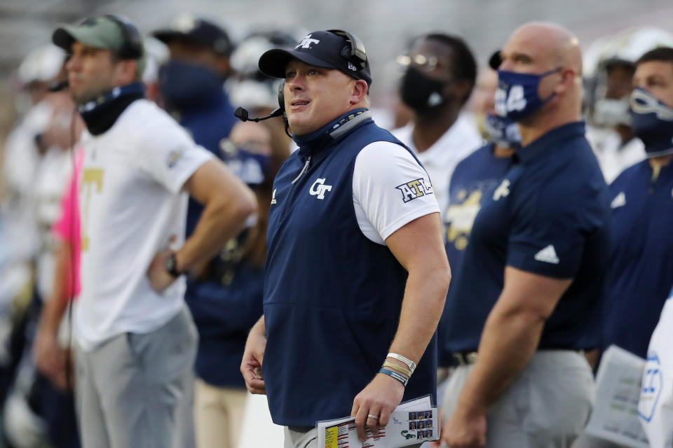 Georgia Tech head coach Geoff Collins watches a Boston College point during the first half of an NCAA college football game, Saturday, Oct. 24, 2020, in Boston. (AP Photo/Michael Dwyer)