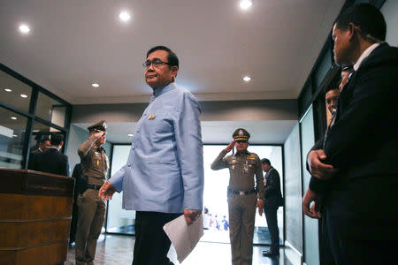 Thailand's Prime Minister Prayuth Chan-ocha arrives before a news conference after a weekly cabinet meeting, after the general election at Government House in Bangkok, Thailand, March 26, 2019. REUTERS/Athit Perawongmetha