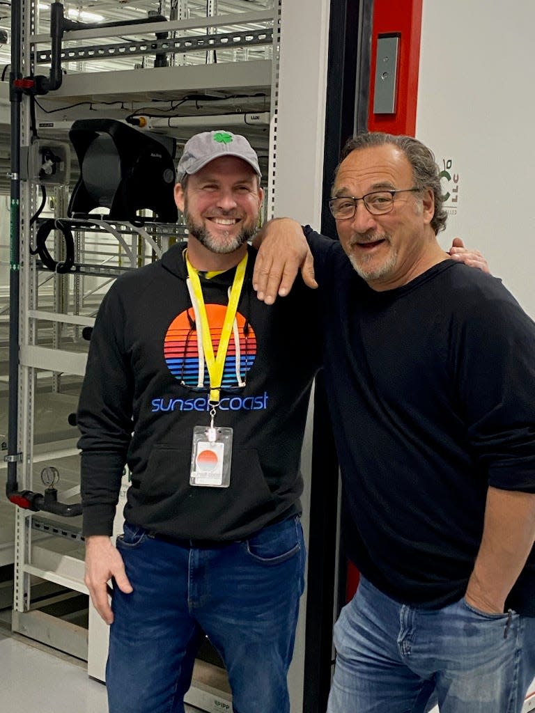 Actor and comedian Jim Belushi visits with Nick Luhowy, chief cultivation officer with Highway Horticulture, which grows and processes products under the Belushi brand.