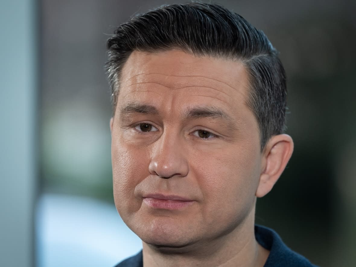 Conservative Leader Pierre Poilievre listens to media questions during a news conference on safety in hospitals in Vancouver on Tuesday, May 14, 2024. (Ethan Cairns/Canadian Press - image credit)