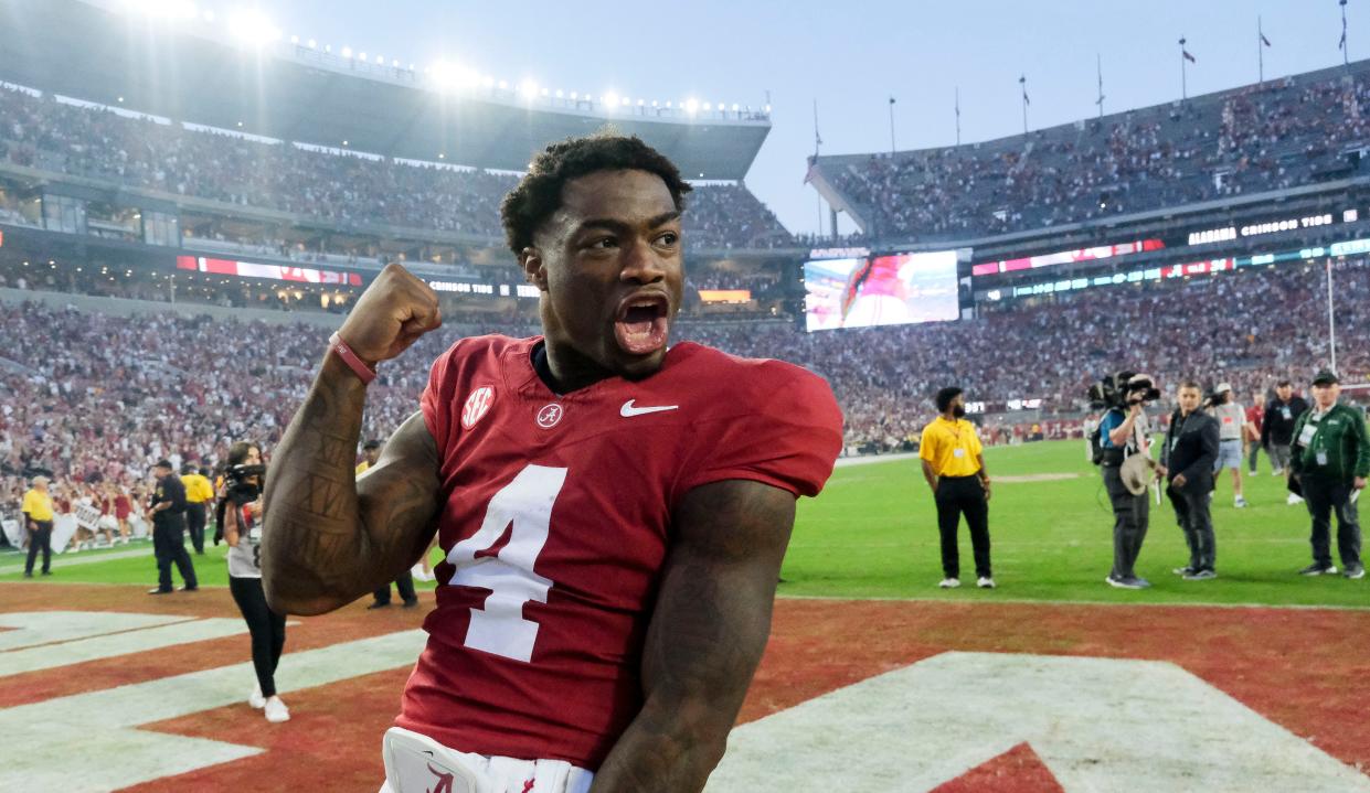 Oct 21, 2023; Tuscaloosa, Alabama, USA; Alabama Crimson Tide quarterback Jalen Milroe (4) celebrates with fans after the Crimson Tide defeated Tennessee 34-20 at Bryant-Denny Stadium. Mandatory Credit: Gary Cosby Jr.-USA TODAY Sports