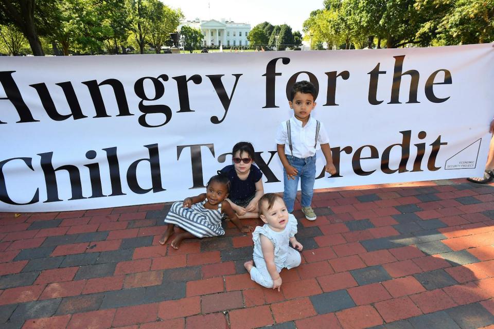 The children of advocates for changes to the child tax credit gathered in front of the White House in September 2022. <a href="https://www.gettyimages.com/detail/news-photo/parents-and-caregivers-with-the-economic-security-project-news-photo/1425648693?adppopup=true" rel="nofollow noopener" target="_blank" data-ylk="slk:Larry French/Getty Images for SKDK;elm:context_link;itc:0;sec:content-canvas" class="link ">Larry French/Getty Images for SKDK</a>