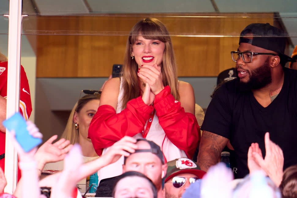 Taylor Swift cheers from a suite as the Kansas City Chiefs play the Chicago Bears at GEHA Field at Arrowhead Stadium on September 24, 2023 in Kansas City, Missouri.