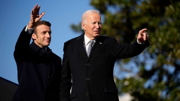 PHOTO: French President Emmanuel Macron and President Joe Biden stand on the stage during a State Arrival Ceremony on the South Lawn of the White House in Washington, Dec. 1, 2022. (Andrew Harnik/AP)