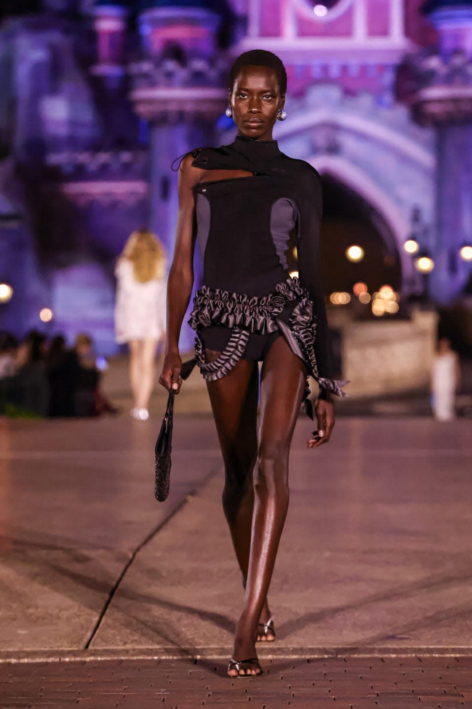 paris, france october 1 editorial use only for non editorial use please seek approval from fashion house a model walks the runway during the coperni paris womenswear spring summer 2025 show as part of paris fashion week at disneyland paris on october 1, 2024 in paris, france photo by lyvans boolakygetty images