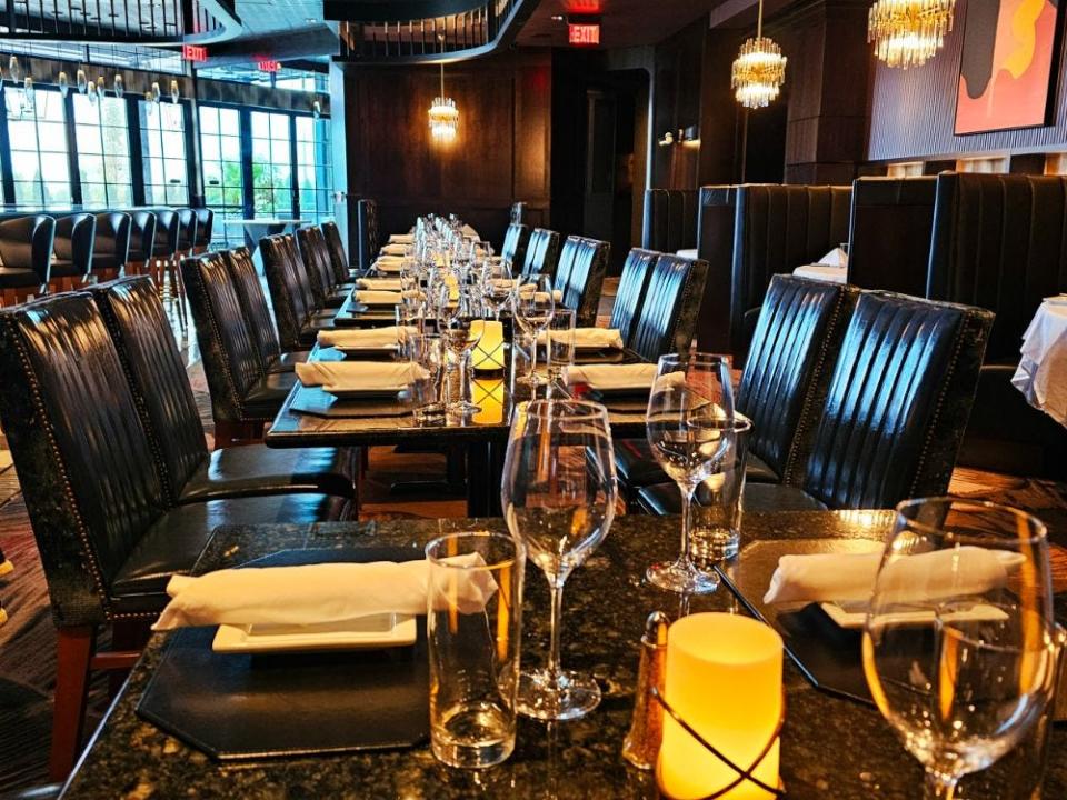 The first-floor dining room offers table seating and big curved Hollywood booths at Ruth's Chris Steak House in West Des Moines.