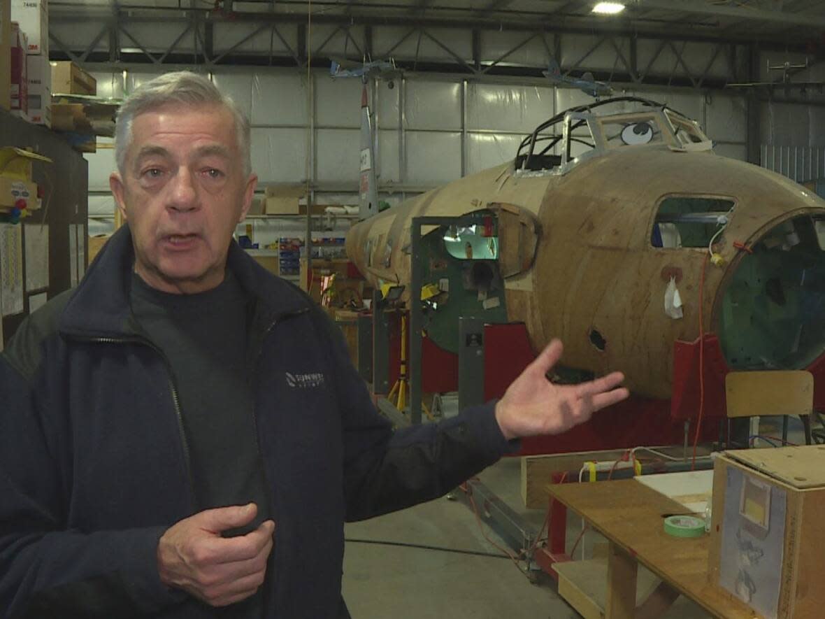 Richard de Boer, president of the Calgary Mosquito Society, says restoring the de Havilland DH.98 Mosquito honours those who gave their lives, those who designed the aircraft and those who served on it. (Dave Gilson/CBC - image credit)
