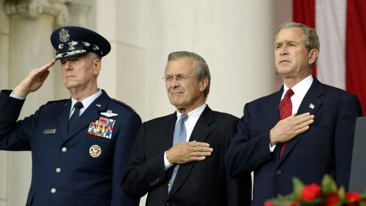 Mandatory Credit: Photo by Chris Kleponis/EPA/Shutterstock (7832260a)Chairman of the Us Joint Chiefs of Staff General Richard Myers (l-r) American Secretary of Defense Donald Rumsfeld and U S President George W Bush Salute the Colors at a Memorial Day Service at Arlington National Cemetery in Suburban Washington Dc On Monday 31 May 2004 While Speaking Later Bush Praised the Efforts of Those That Have Given Their Lives For the Country and Those That Serve in the Military TodayUsa Memorial Day - May 2004.