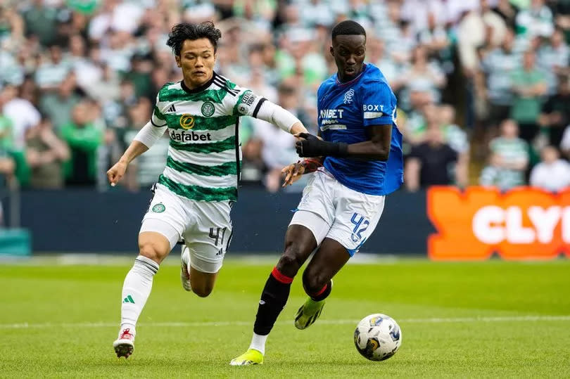 Celtic's Reo Hatate and Rangers' Mohamed Diomande