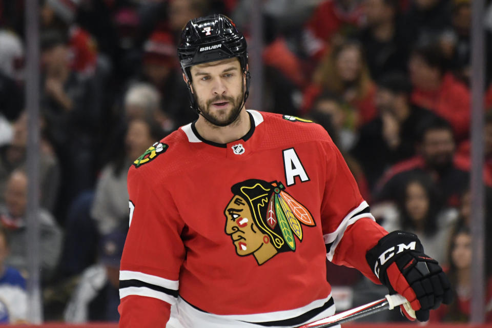 FILE - Chicago Blackhawks defenseman Brent Seabrook plays against the Buffalo Sabres during the first period of an NHL hockey game in Chicago, in this Sunday, Nov. 17, 2019, file photo. Longtime Chicago Blackhawks defenseman and three-time Stanley Cup winner Brent Seabrook announced Friday, March 5, 2021, he’s unable to continue playing hockey because of injury. (AP Photo/David Banks, File)