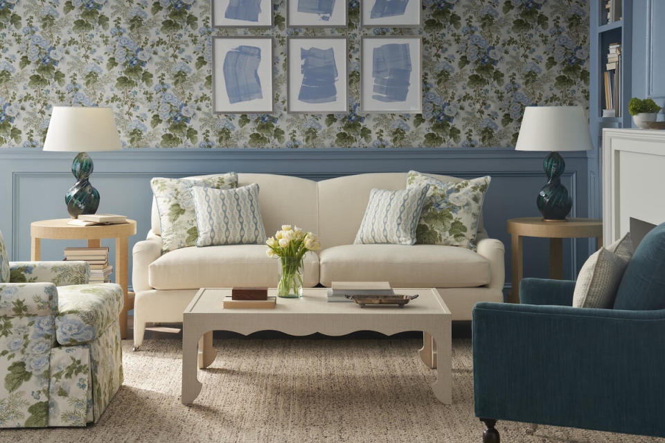 Selections from the Lee Jofa 200 Collection, including the Lottie sofa, Oliver cocktail table and Hollyhock hand-block wallpaper in Blue Leaf