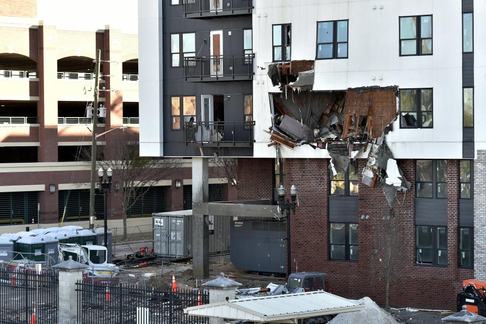 Sections of the west side of the fire-damaged RISE Doro apartment building are evident Monday morning, Jan. 29, 2024. Crews worked through the night to contain the fire that burned through the apartment building under construction on A. Philip Randolph Blvd. near the baseball stadium and the Veterans Memorial Arena.