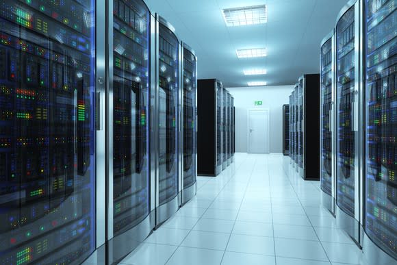Interior of a data center with rows of servers.