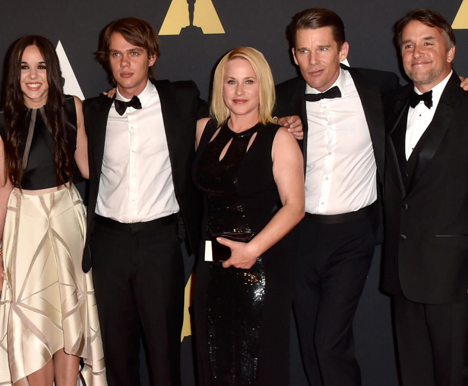 Ellar Coltrane, star of ‘Boyhood,’ left, is pictured here with the cast of the film, along with director Richard Linklater, far right. The young actor intimated to Yahoo Movies inside the show that Saturday’s star-studded event was “surreal” as the film marks his foray into movie acting. It was early in the evening, as his publicist primed him for introductions: “I’m going to introduce you to some people who are really really famous and you’re going to go .”