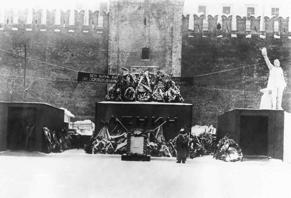 FILE - The first mausoleum of Soviet founder Vladimir Lenin, who dead in Jan. 21, 1924 is set at Red Square next to the Kremlin Wall in Moscow, Russia on Feb. 25, 1924. Lenin was already in poor health when the USSR was formed and he died of a stroke little more than a year later. Josef Stalin outmaneuvered rivals in the ensuing battle for power. (AP Photo/File)