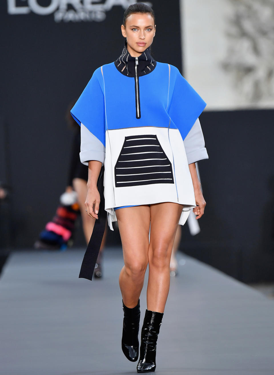 <p>Irina looked sporty in this bright getup at L'Oreal.</p>