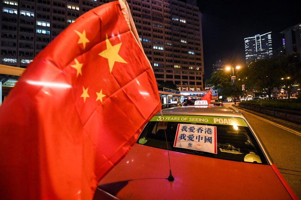 中國內地網約車平台攻港，勢衝擊香港的士業界。 (Mao Siqian/Xinhua via Getty Images)