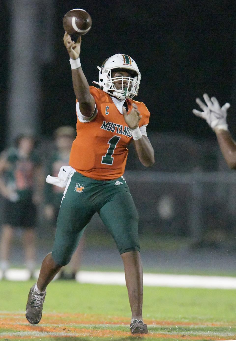 Mandarin's quarterback Tramell Jones (1) throws a pass during third quarter action. The Atlantic Coast Stingrays traveled to Mandarin to play the Mustangs in High School football Friday, September 15, 2023.