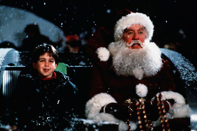 <p>Disney/Kobal/Shutterstock</p> Eric Lloyd and Tim Allen in 'The Santa Clause'.