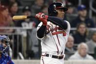 Apr 1, 2019; Atlanta, GA, USA; Atlanta Braves second baseman Ozzie Albies (1) doubles before scoring against the Chicago Cubs during the fifth inning at SunTrust Park. Mandatory Credit: Dale Zanine-USA TODAY Sports