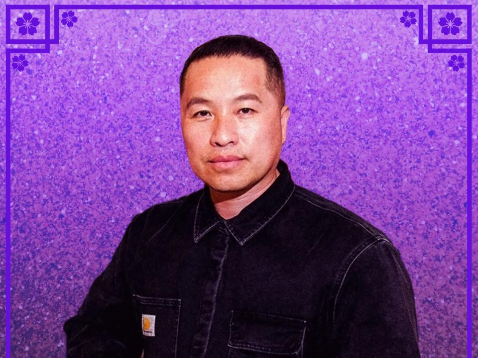 Phillip Lim in front of a purple background