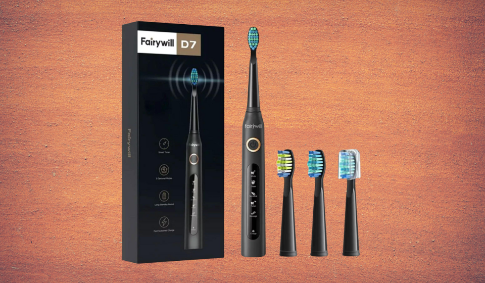 black electric toothbrush with box and 3 alternate brush heads