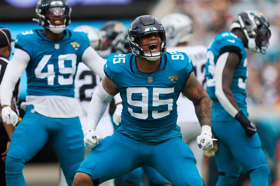 Jacksonville Jaguars defensive end Roy Robertson-Harris (95) reacts to a defensive stop during the first quarter of a regular season NFL football matchup Sunday, Nov. 6, 2022 at TIAA Bank Field in Jacksonville. The Jacksonville Jaguars held off the Las Vegas Raiders 27-20. [Corey Perrine/Florida Times-Union]