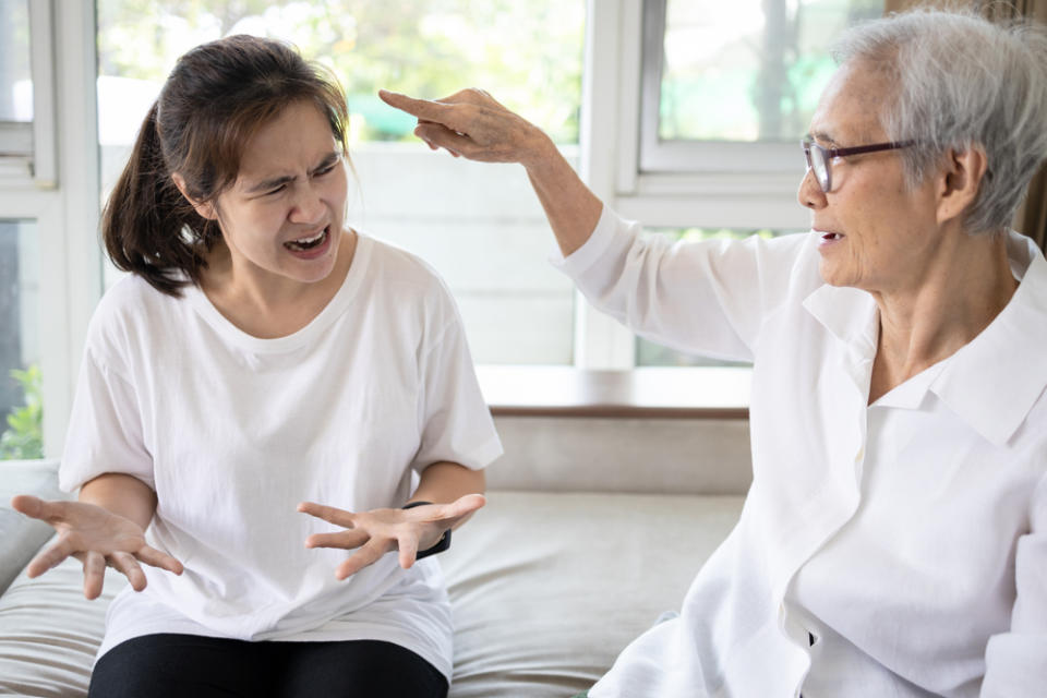 A young woman and an old woman arguing