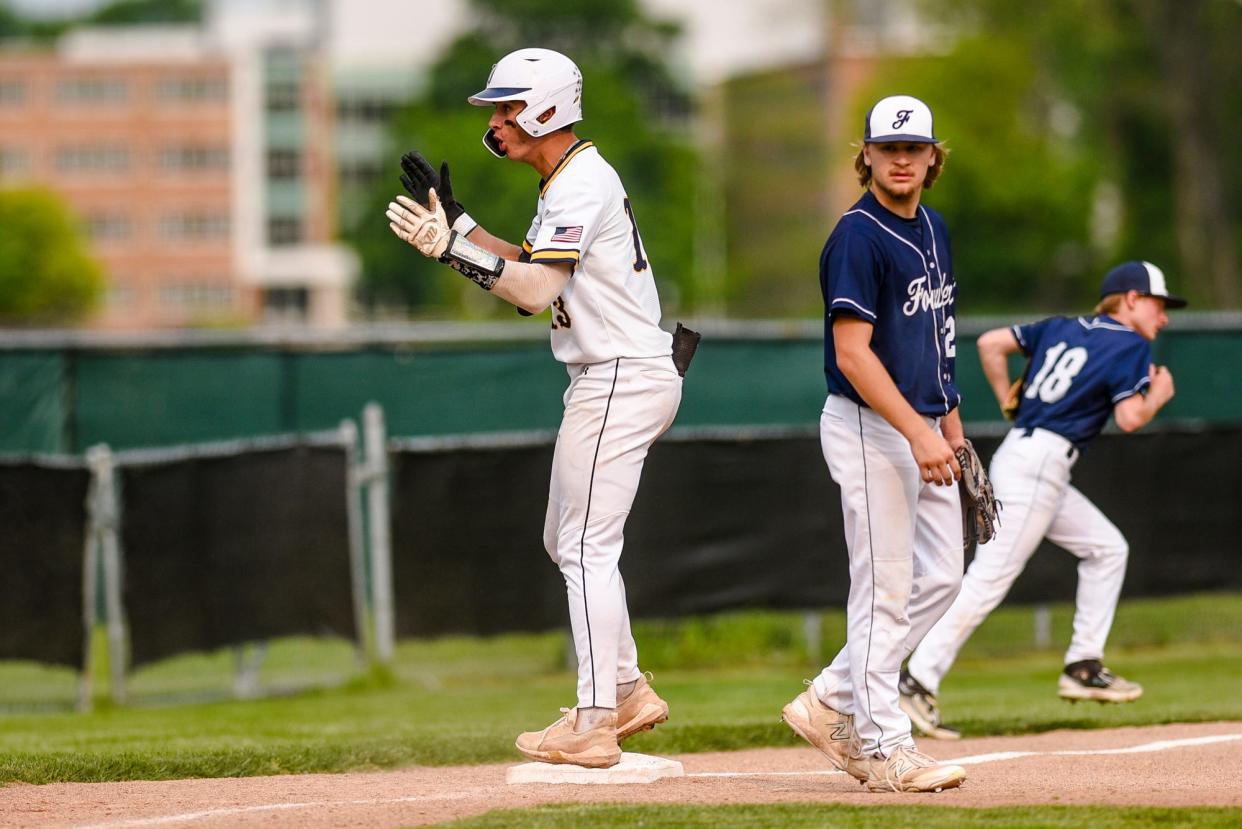 DeWitt's Aj Alicea celebrates his triple against Fowler during the second inning on Monday, May 22, 2023, at Kircher Municipal Park in Lansing.