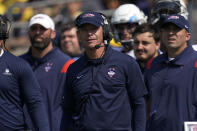 Connecticut head coach Jim Mora watches in the first half of an NCAA college football game against Michigan in Ann Arbor, Mich., Saturday, Sept. 17, 2022. (AP Photo/Paul Sancya)