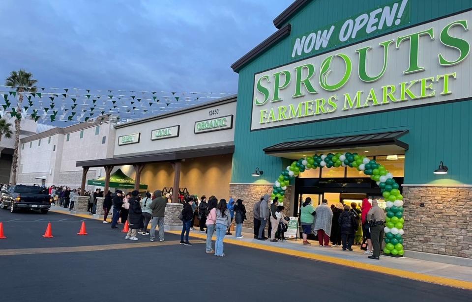 Fans of Sprouts Farmers Market lined up before dawn to enter the company’s newest grocery store, this one on Amargosa Road in Victorville.