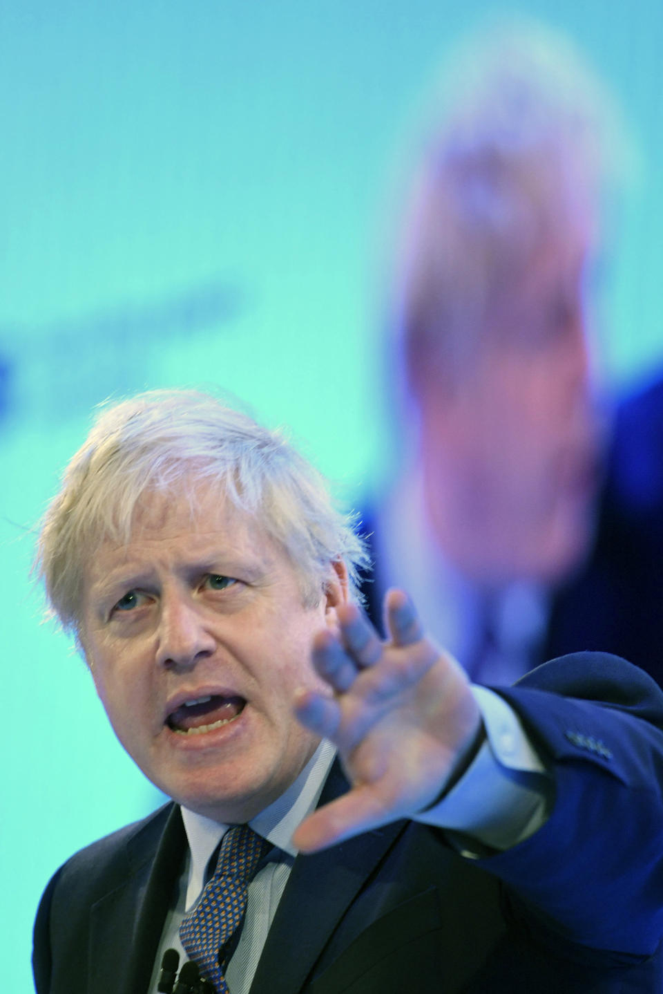 Britain's Prime Minister Boris Johnson speaking at the Confederation of British Industry (CBI) annual conference in London, Monday Nov. 18, 2019. Britain's Brexit is one of the main issues for political parties and for voters, as the UK goes to the polls in a General Election on Dec. 12. (Stefan Rousseau/PA via AP)