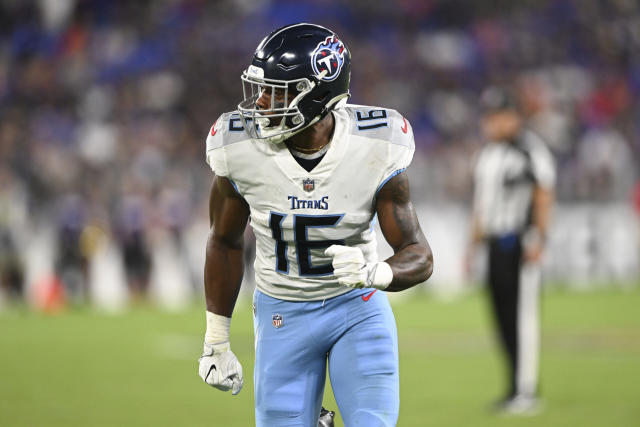 Tennessee Titans' Treylon Burks, with one catch, leaves coach Mike