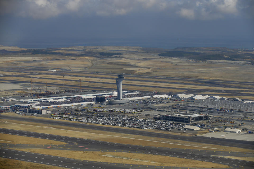 This Sept. 23, 2018, photo, shows an aerial view of Istanbul's new airport ahead of its opening. The first phase of the airport, one of Turkey's President Recep Tayyip Erdogan's major construction projects, is scheduled to be inaugurated on Oct. 29, 2018 when Turkey celebrates Republic Day. The massive project, has been mired in controversy over worker's rights and environmental concerns amid a weakening economy. (AP Photo/Emrah Gurel)