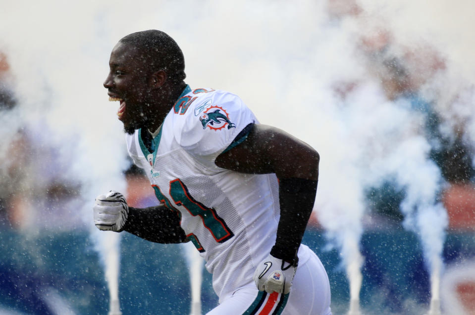 MIAMI GARDENS, FL - DECEMBER 04: Vontae Davis #21 of the <a class="link " href="https://sports.yahoo.com/nfl/teams/miami/" data-i13n="sec:content-canvas;subsec:anchor_text;elm:context_link" data-ylk="slk:Miami Dolphins;sec:content-canvas;subsec:anchor_text;elm:context_link;itc:0">Miami Dolphins</a> is introduced before a NFL game against the Oakland Raiders at Sun Life Stadium on December 4, 2011 in Miami Gardens, Florida. (Photo by Ronald C. Modra/Getty Images)