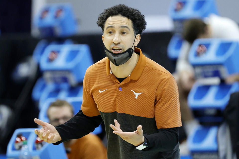 Texas coach Shaka Smart talks to his players during a loss to  Abilene Christian in the first round of the NCAA tournament on March 20. (Tim Nwachukwu/Getty Images)