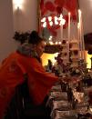 <p>Nussbaumer utilized Chinese-inspired decor from the table linens, from paper lanterns to mini pagodas, to help create a gorgeous tablescape. Her extra-long dining table is perfect for a socially distanced meal before following her family's tradition of having a dance party into the wee hours after dinner. </p>