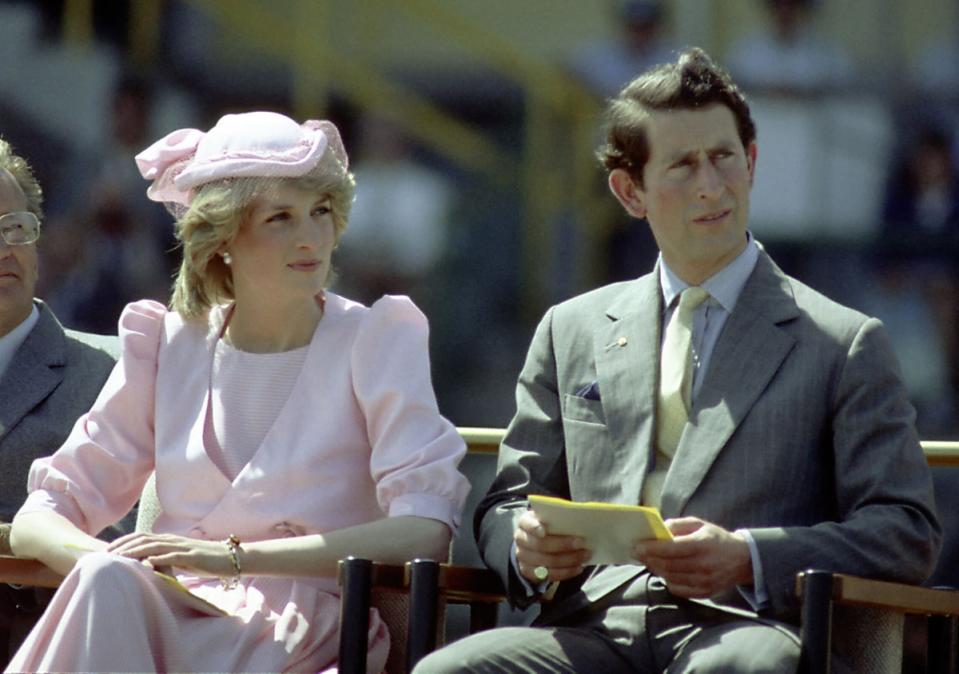 Princess Diana And Prince Charles watch an official event during their first royal Australian tour 1983 (Getty)
